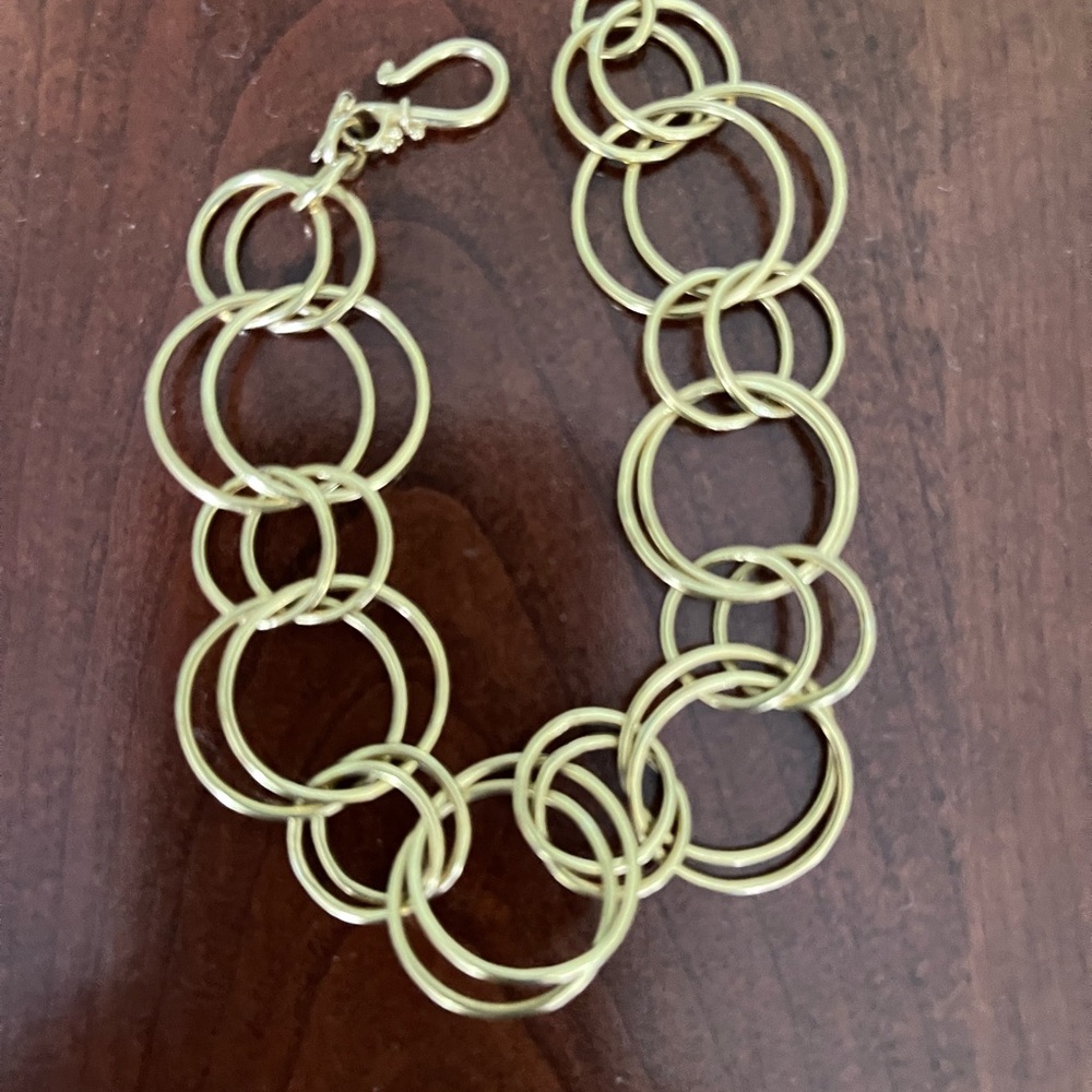 22kt link bracelet.  Charms can be added.  Barely worn. Dress up or every day.